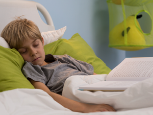 kids bedroom ideas child asleep reading in bed good sleep expert